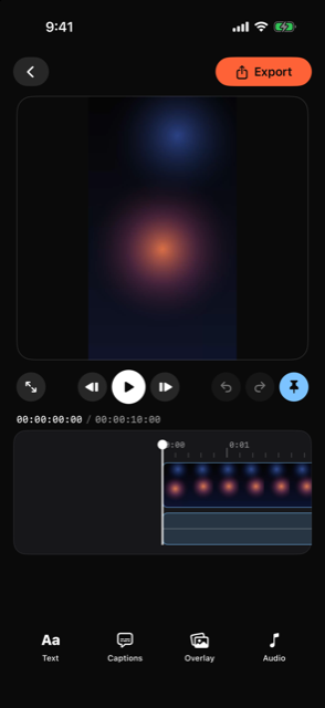 The built-in video editor: a portrait clip in preview, playhead and timecode over a filmstrip timeline, and Text, Captions, Overlay, Audio tools.